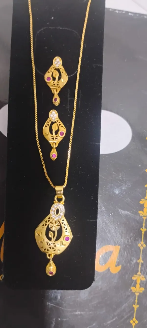 Gold_Plated_Designer_Necklace_And_Earrings_Set_With_Purple_Stones