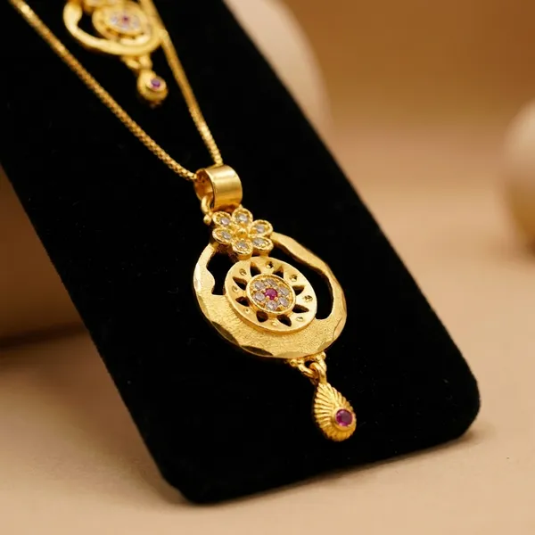 Traditional_Gold_Plated_Floral_Pendant_Necklace_Set_With_Pink_Stone_Accents