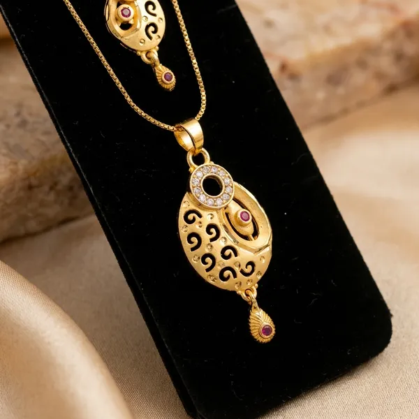 Traditional_Gold_Toned_Mangalsutra_Pendant_Set_With_Pink_Stone_Accents