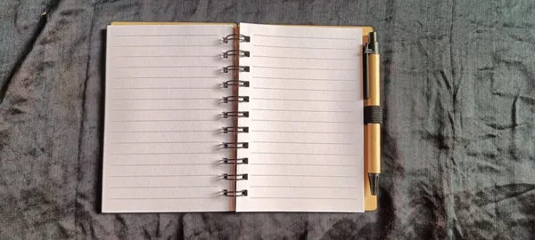 Spiral_Bound_Lined_Notebook_With_Bamboo_Pen