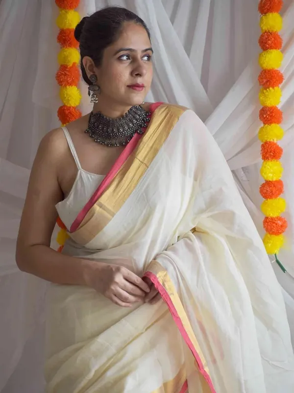 Cream_Self_Design_Premium_Saree_For_Women