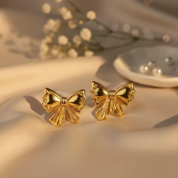 Anti_Tarnish_Gold_Bow_And_Statement_Leaf_Drop_Earrings_For_Women_|_Pack_Of_2