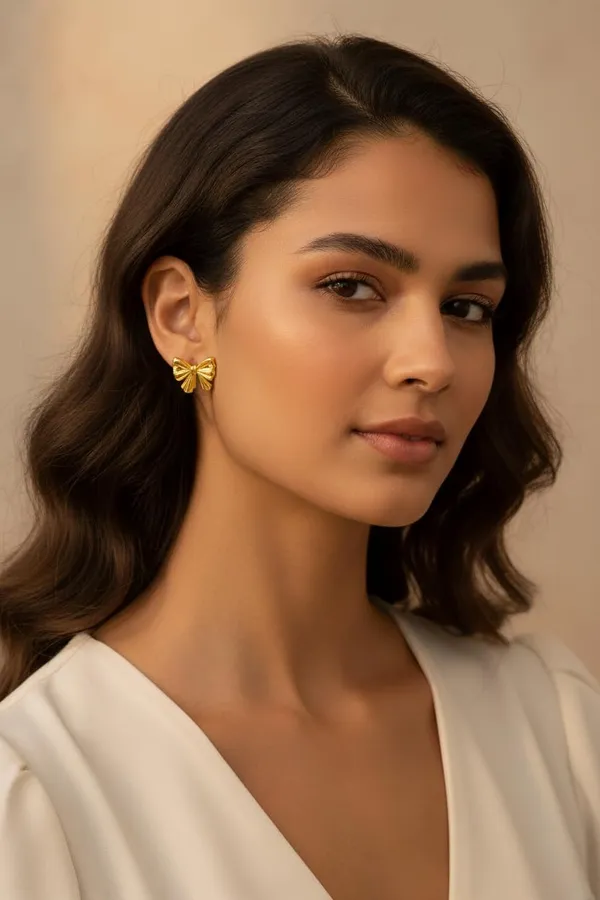 Anti_Tarnish_Gold_Bow_And_Statement_Leaf_Drop_Earrings_For_Women_|_Pack_Of_2