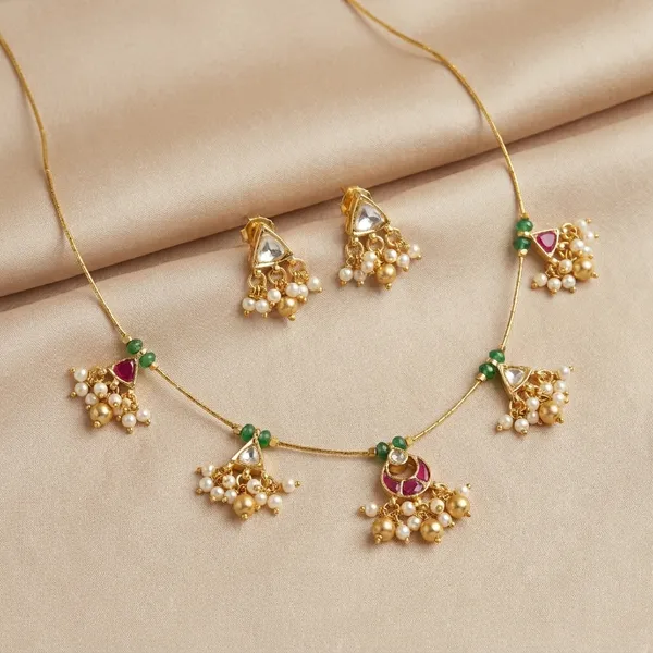 Invisible_Necklace_Traditional_Gold_Toned_Kundan_Necklace_Set_with_Earrings