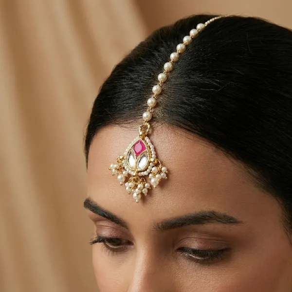 Traditional_Golden_Maang_Tikka_with_Pearl_Chain_and_Pink_Stone_Pendant