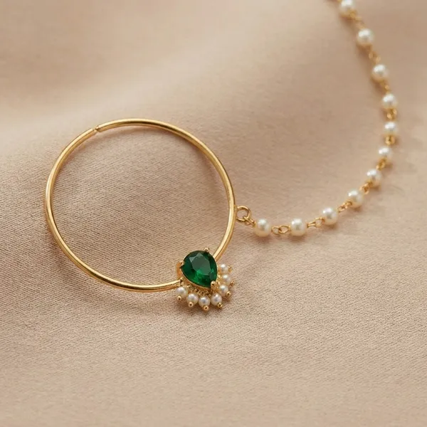 Gold_toned_Nose_pin_with_Green_Stone_and_Chain