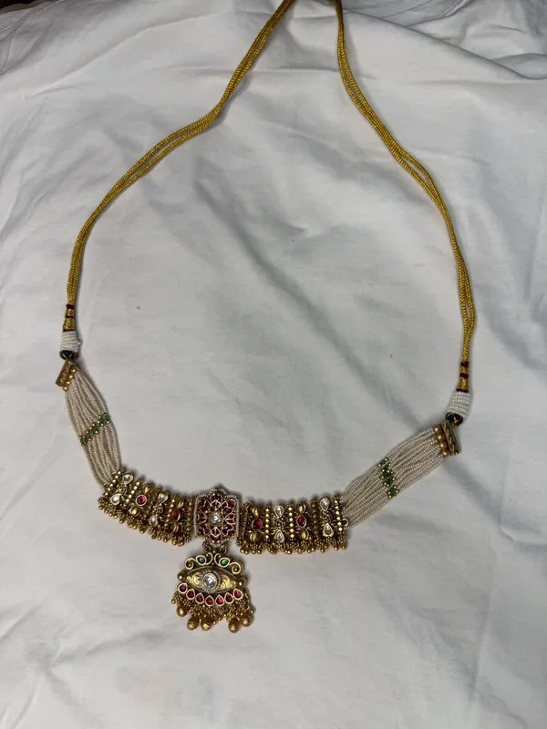 Multicolor_Gold-Toned_Alloy_Kundan_Pearl_Necklace_Set_With_Jhumka_For_Women