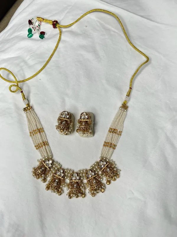 Multicolor_Off_White_Antique_Gold_Kundan_Jhumka_Necklace_Set_For_Women
