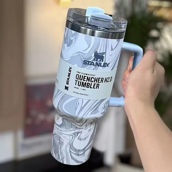 STANLEY_Quencher_H2.0_Tumbler_with_Handle_and_Straw_30_oz_|_Flowstate_3-Position_Lid_|_Cup_Holder_Compatible_for_Travel_|_Insulated_Stainless_Steel_Cup_|_BPA-Free_