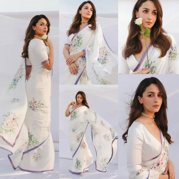 Elegant_White_Floral_Embroidered_Saree_With_Purple_Border