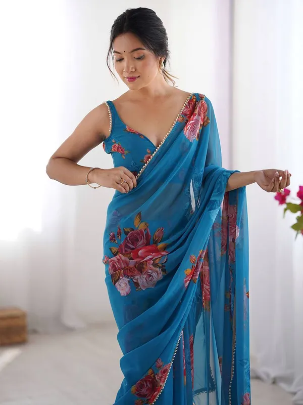 Blue_Floral_Print_Saree_With_Embellished_Border