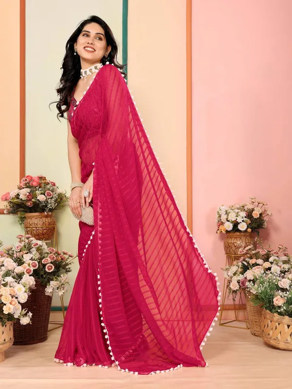 Magenta_Pink_Georgette_Saree_With_Pom-Pom_Border_And_Embroidered_Blouse