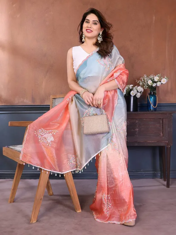 Elegant_Ombre_Saree_With_Floral_Embroidery_And_Pom-Pom_Border