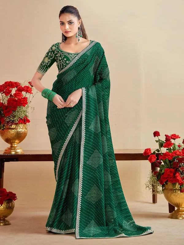 Green_Bandhani_Saree_With_Heavy_Embellished_Blouse