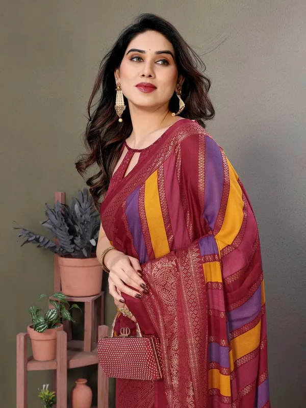 Multicolor_Striped_Saree_With_Intricate_Border_And_Keyhole_Blouse