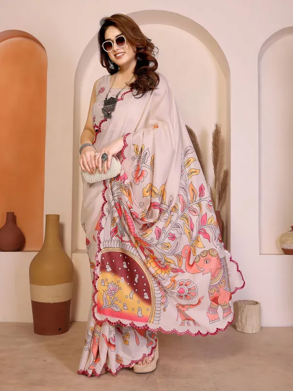 Elegant_Pastel_Pink_Embroidered_Saree_With_Scalloped_Border