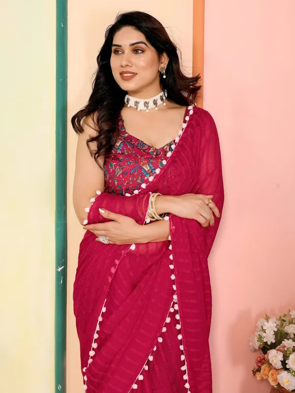 Magenta_Pink_Georgette_Saree_With_Pom-Pom_Border_And_Embroidered_Blouse