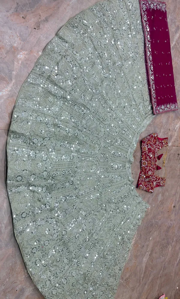 Silver_Sequin_Lehenga_With_Red_Embroidered_Blouse_And_Pink_Dupatta