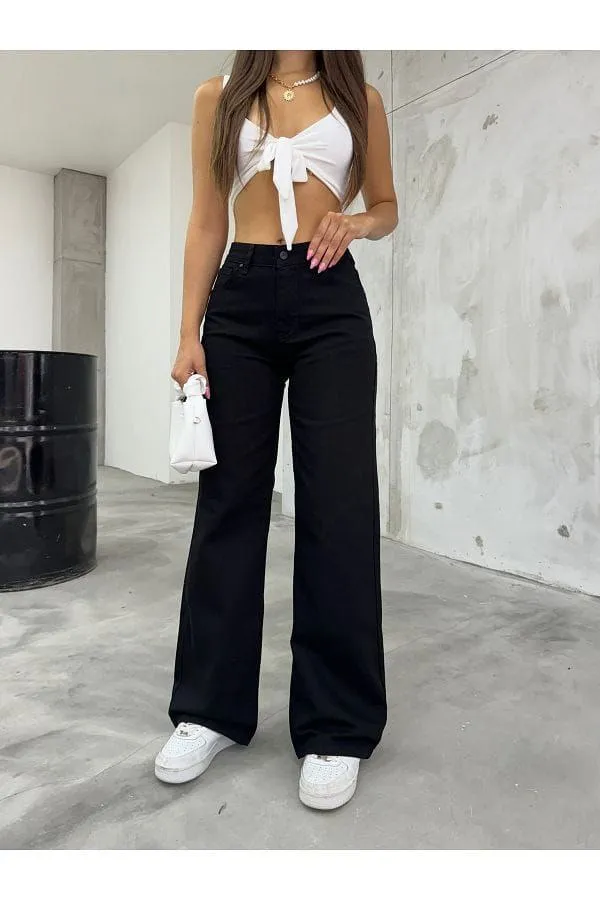 Black_High-Waisted_Wide-Leg_Trousers_With_White_Tie-Front_Crop_Top
