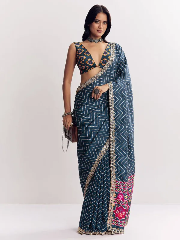 Navy_Blue_Sequin_Embellished_Saree_With_Golden_Border_And_Embroidered_Blouse