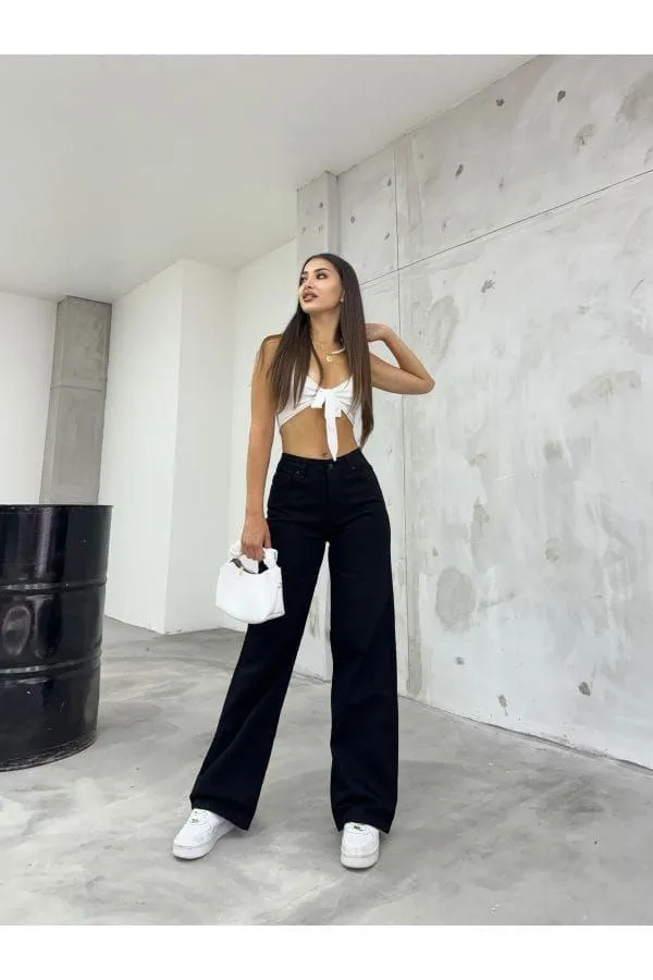 Black_High-Waisted_Wide-Leg_Trousers_With_White_Tie-Front_Crop_Top