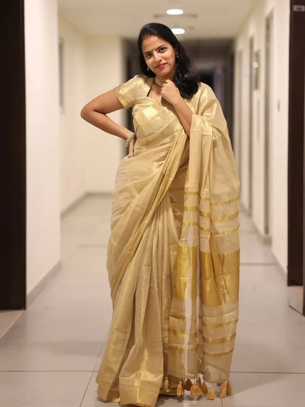 Off_White_Tissue_Silk_Kasavu_Zari_Border_Tassel_Pallu_Saree_For_Women