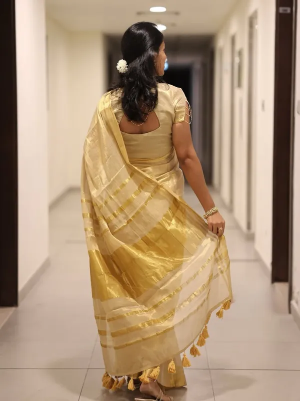 Off_White_Tissue_Silk_Kasavu_Zari_Border_Tassel_Pallu_Saree_For_Women