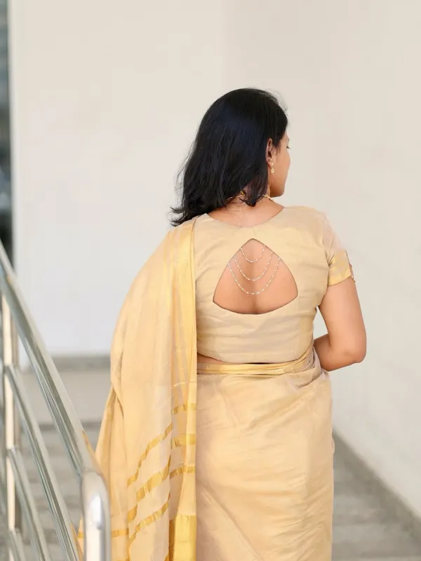 Off_White_Tissue_Silk_Kasavu_Zari_Border_Tassel_Pallu_Saree_For_Women