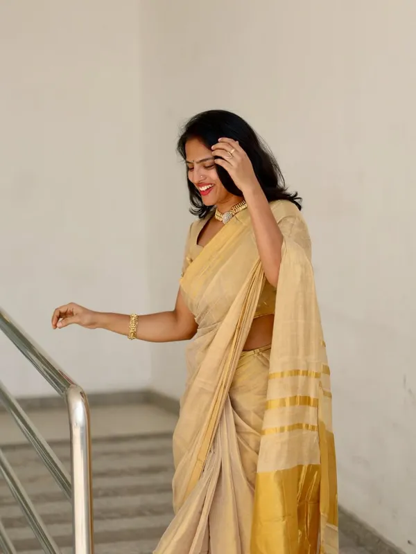 Off_White_Tissue_Silk_Kasavu_Zari_Border_Tassel_Pallu_Saree_For_Women