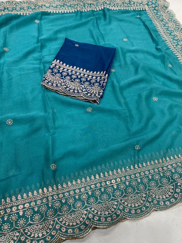 Teal_Embroidered_Georgette_Saree_with_Contrast_Embroidered_Blouse