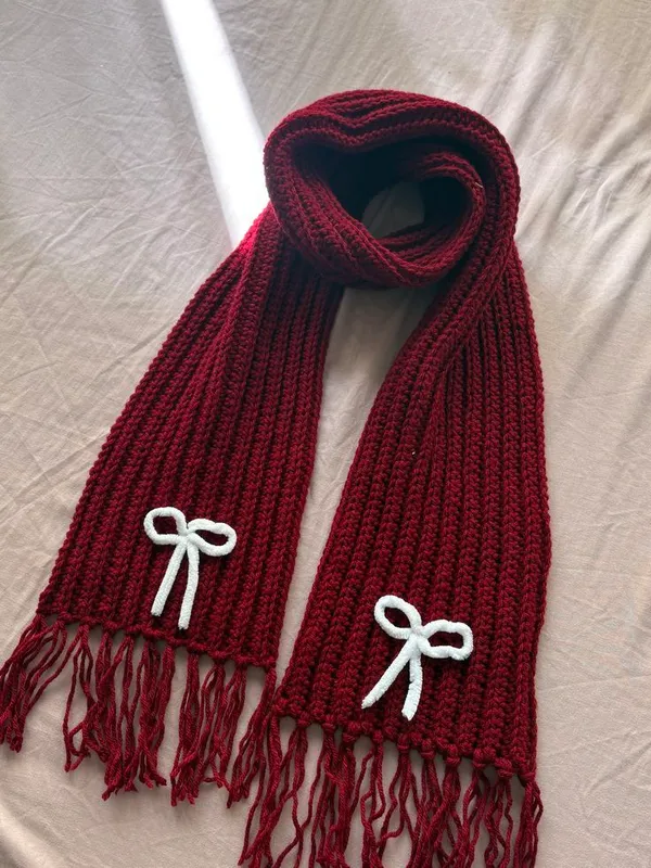 Deep_Maroon_Knitted_Winter_Scarf_with_White_Bow_Accents