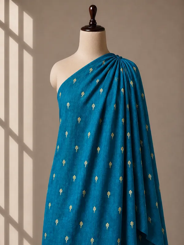Peacock_Blue_Floral_Butti_Embroidered_Premium_Vichitra_Silk_Fabric_(Price_Per_Meter)