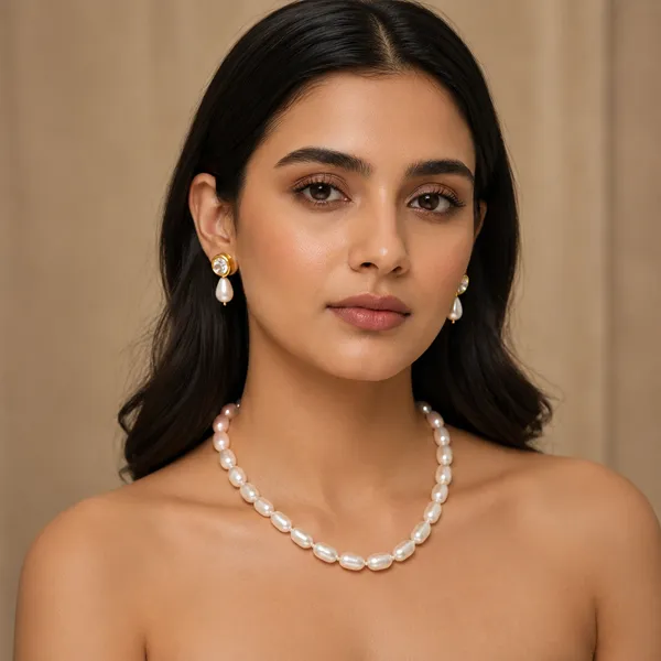 White_Drop_Shaped_Pearl_With_Earrings