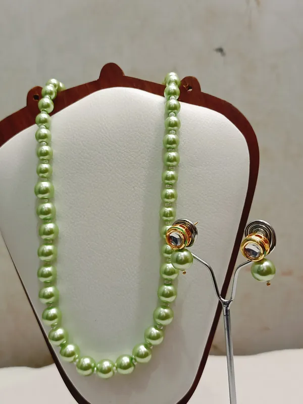 Premium_Green_Shade_Pearls_With_Golden_Earrings