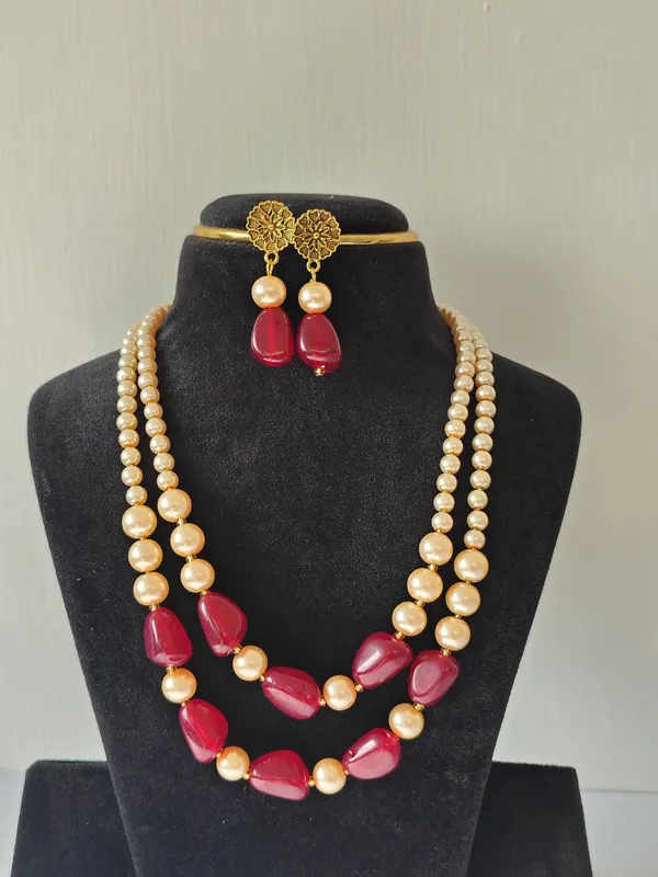 Maroon_Stone_&_Golden_Shade_Pearl_Necklace_With_Earrings