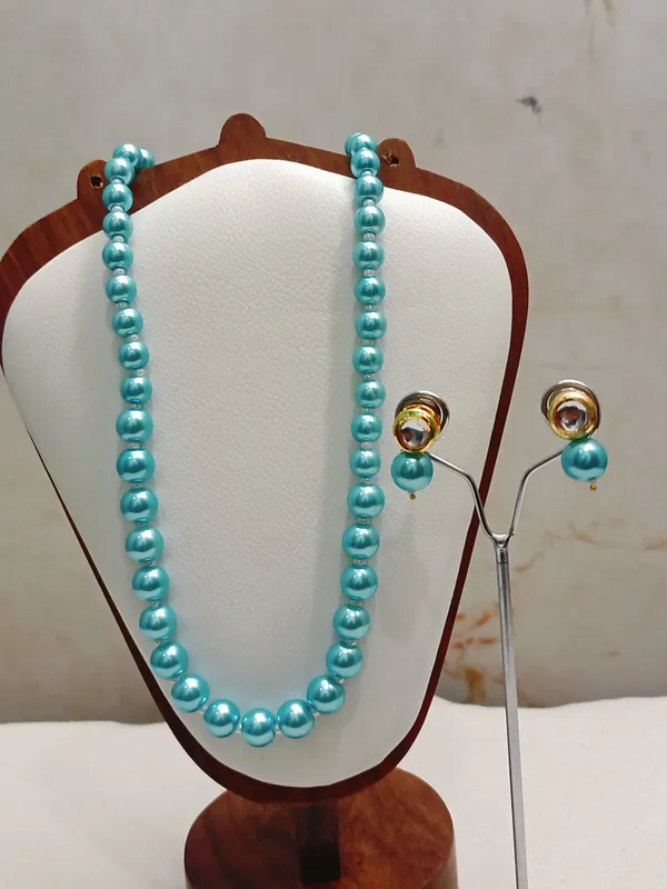 Sky_Blue_Pearl_With_Golden_Earrings