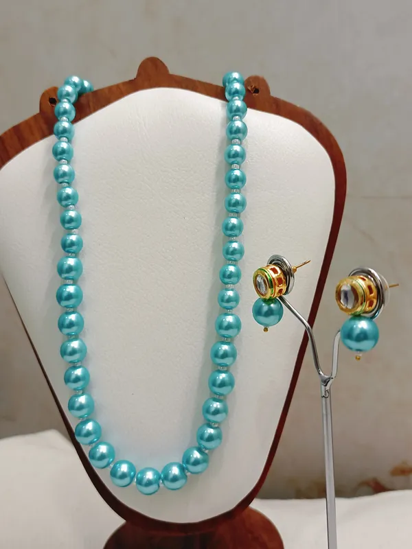 Sky_Blue_Pearl_With_Golden_Earrings