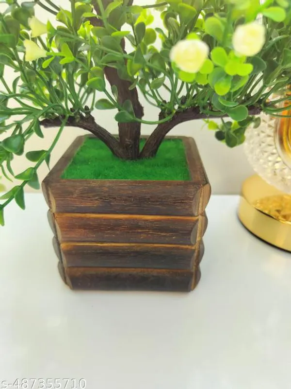 Green_Artificial_Plant_Bush_With_Small_Yellow_Flower_And_Wooden_Pot