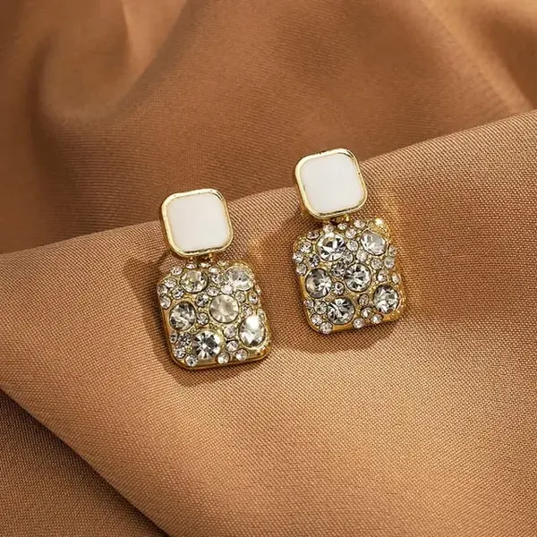 TGO_Holographic_Angel_Wing_Statement_Earrings