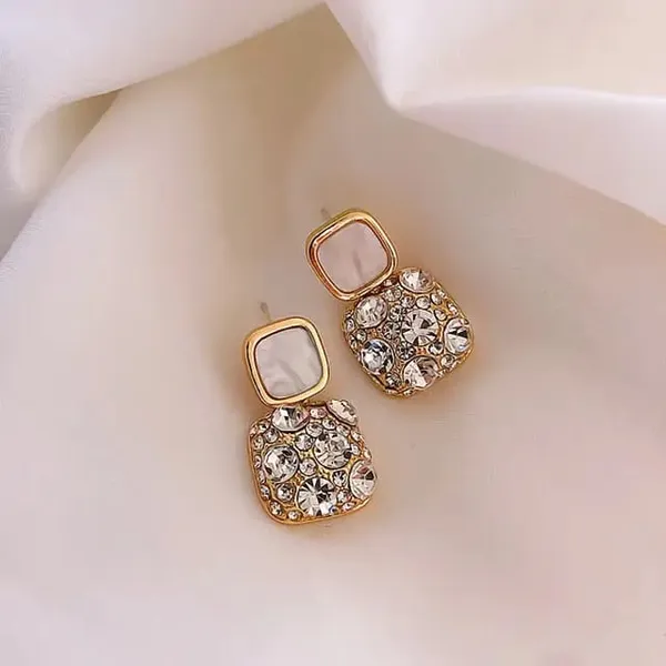 TGO_Holographic_Angel_Wing_Statement_Earrings