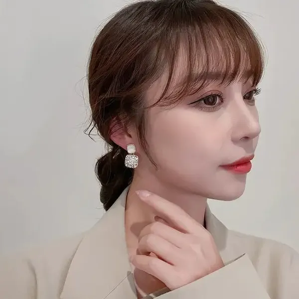 TGO_Holographic_Angel_Wing_Statement_Earrings