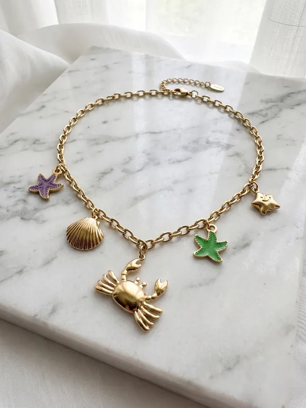 TGO_Ocean_Charm_Gold_Necklace_with_Crab,_Shell_&_Starfish_Accents