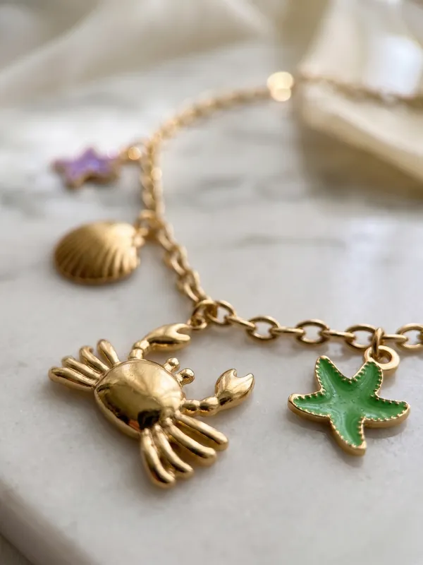 TGO_Ocean_Charm_Gold_Necklace_with_Crab,_Shell_&_Starfish_Accents
