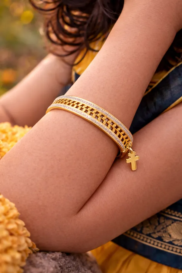 Elegant_Gold-_White_Tone_Bangle_With_Cross_Charm