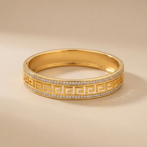 Elegant_Gold-Toned_Greek_Key_Pattern_Bangle_with_Sparkling_Zirconia