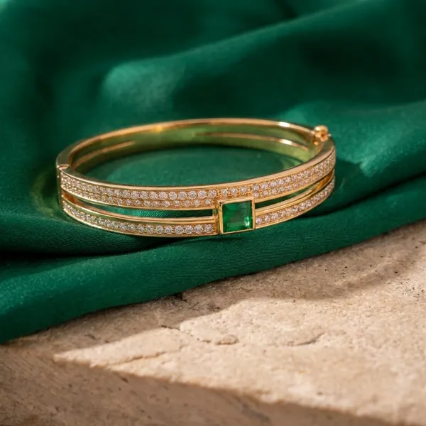 Elegant_Gold-Toned_Bangle_With_Green_Stone_And_Diamond_Accents