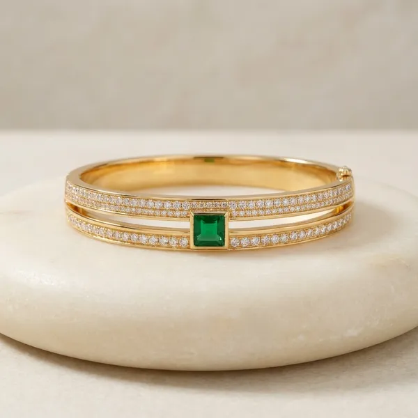 Elegant_Gold-Toned_Bangle_With_Green_Stone_And_Diamond_Accents