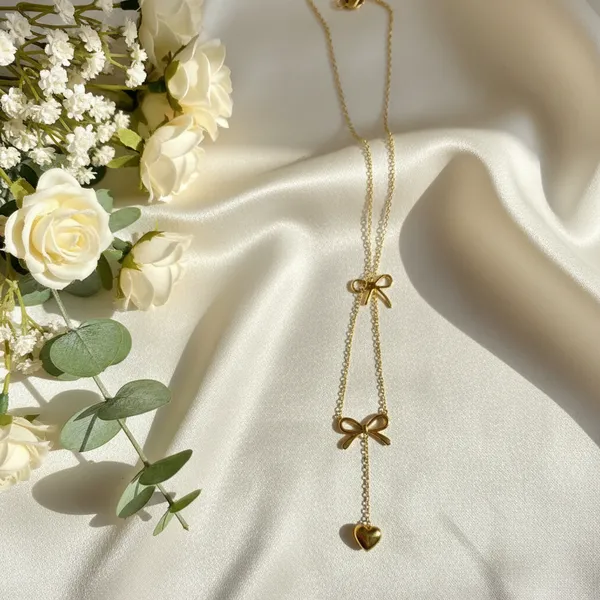 Gold_Dual_Bow_Heart_Drop_Necklace