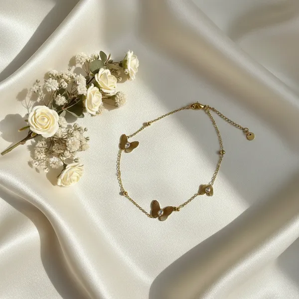 Gold_Butterfly_Charm_Bracelet_With_Crystal_Accents