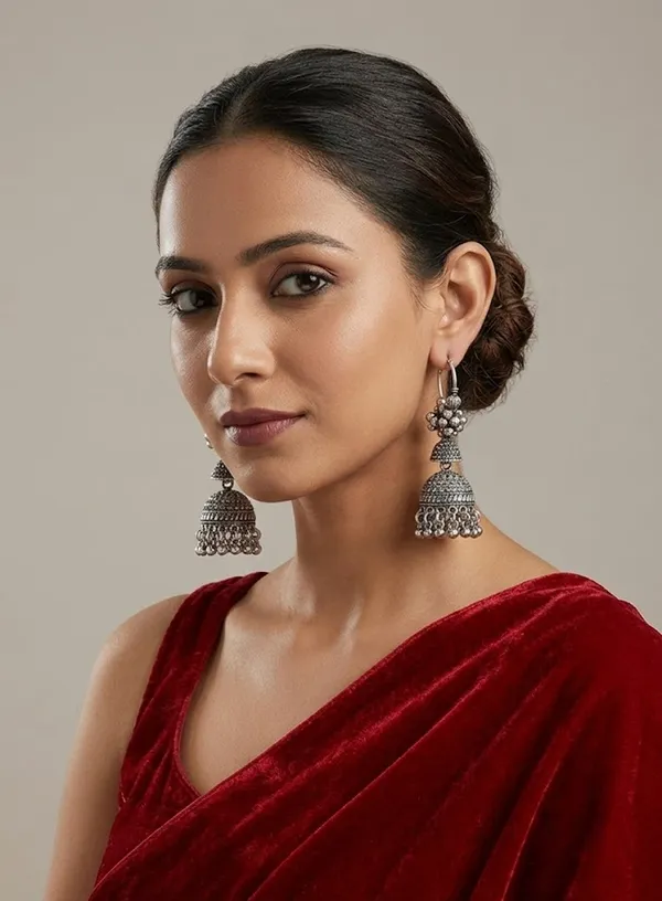 Oxidized_Silver_Jhumka_Earrings_With_Intricate_Tribal_Design